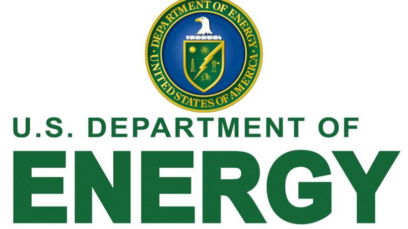 U.S. Department of Energy logo with a blue and green shield featuring energy-related symbols and a bald eagle.