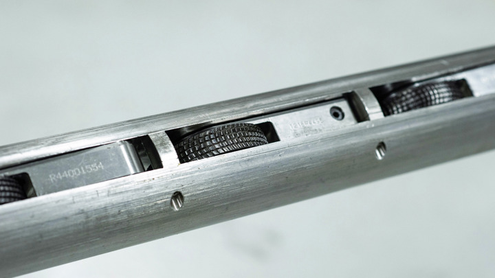 Close-up of Well Tractor 218 with extended wheel arms, designed to overcome restrictions during complex well intervention operations.