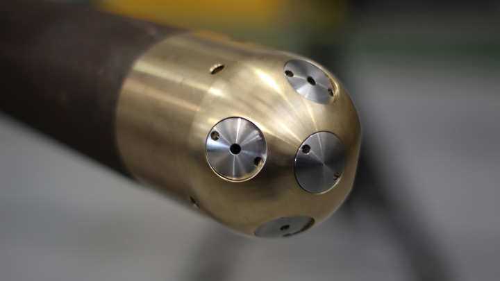 Close-up of Downhole Jetting Tool used for taking formation samples and restoring well production efficiency.