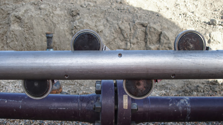 Close up of a Well Tractor tool with multiple drive wheels after completing a 23,500 ft single-pass conveyance during a well intervention operation.