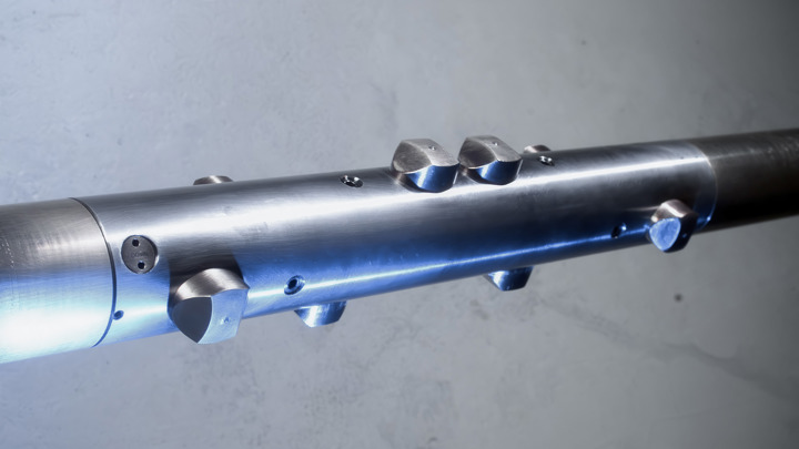 Close-up of a toolstring designed for open hole pressure measurement and fluid sampling during well intervention operations.
