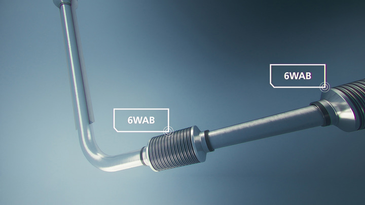 Diagram showing two 6WAB tools positioned along wellbore tubing in a deviated well for zonal isolation.