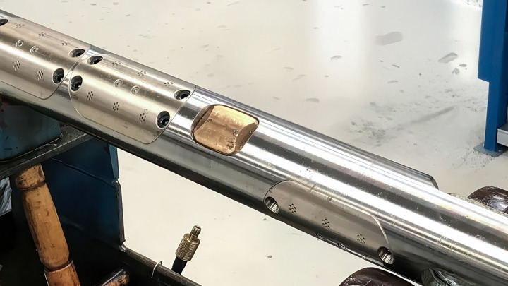 Close-up of a bespoke anchoring system designed for secure deployment through high-delta ID variations in complex wellbore environments.