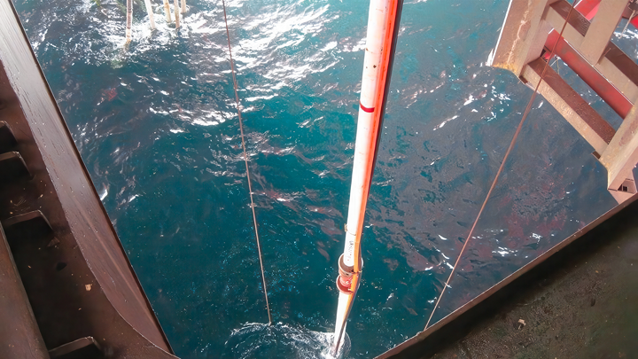 Offshore operation showing tool deployment into the sea to mill out a malfunctioning lubricator valve during a well intervention in Malaysia.